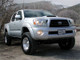 Tuff Country 05-23 Toyota Tacoma 4x4 & PreRunner 3in Lift Kit (Excludes TRD Pro) SX6000 Shocks - 52907KH Photo - Mounted