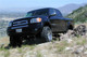 Tuff Country 99-04 Toyota Tundra 4x4 & 2wd 4.5in Lift Kit (SX6000 Shocks) - 55900KH Photo - Mounted