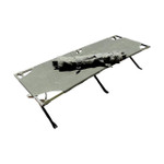 Army Cot - folded and wrapped cot resting on top of  unfolded cot