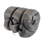 McKinley -30° sleeping bag rolled and secured with straps