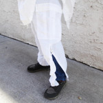 Snow white trousers - closeup of cargo pocket and leg zipper