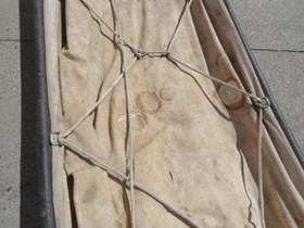 Ahkio Sled - closeup of tarp tied down with rope and hooks (used)
