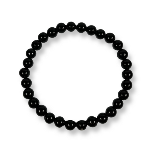 A handcrafted bracelet featuring polished, spherical black obsidian beads with a high-gloss finish. The deep black stones are strung on an elastic cord, reflecting soft light on their smooth surfaces against a neutral white background.