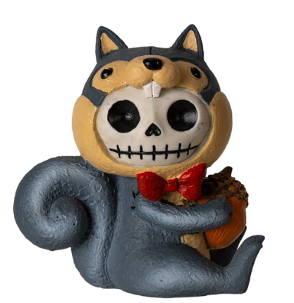 Whimsical gray squirrel resin figurine with a skull face, wearing a red bow tie, holding an acorn, and featuring a curled tail.