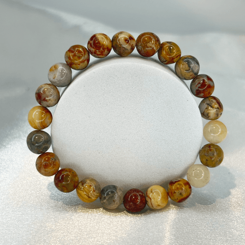 Crazy Lace Agate Gemstone Bracelet featuring polished natural multicolor agate beads with unique earthy patterns.