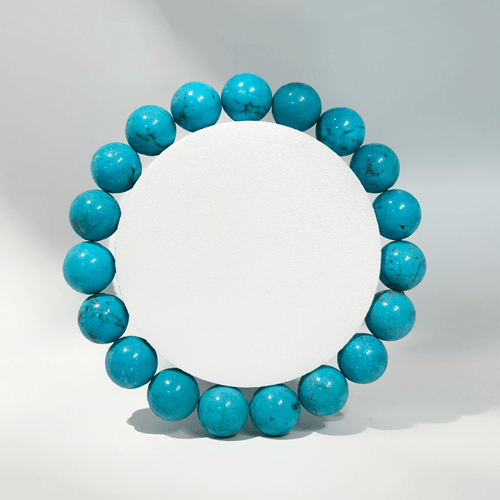 Bracelet made of smooth, round, 10mm turquoise-blue dyed howlite gemstone beads,