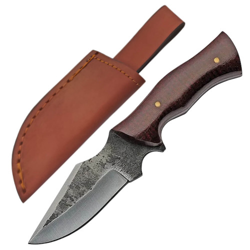 Hammered dark blade hunting knife with a reddish-brown wooden handle, two light pins, and a brown stitched leather sheath with a belt loop. Hammered dark blade hunting knife with a reddish-brown wooden handle, two light pins, and a brown stitched leather sheath with a belt loop.