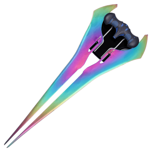 A full-view studio shot of a metal replica Halo Energy Sword against a white background. The iconic dual-blade design features an "oil slick" iridescent coating that transitions through hues of pink, purple, blue, green, and yellow. The handle is a matte black and dark blue contoured grip designed for a single-hand hold, set within a black triangular hilt.