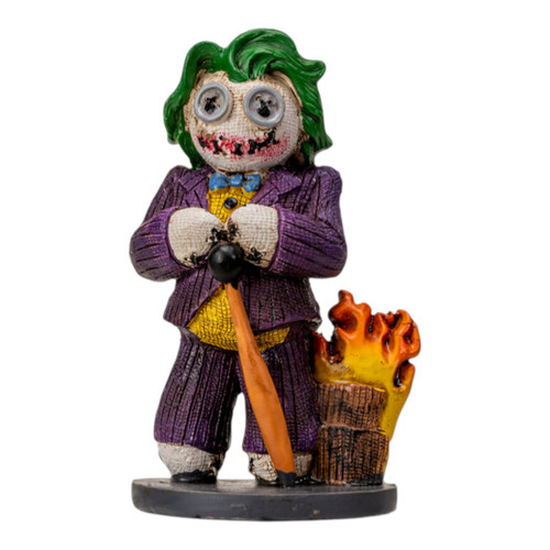 Creepy clown doll figurine with green hair and purple suit, gothic horror collectible statue with stitched face and bat, spooky decor piece