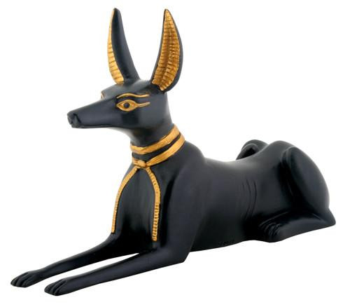 Black and gold Anubis figurine head detail, ancient Egyptian jackal deity decor piece for display and collection