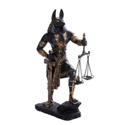 Anubis Egyptian god statue holding scales, black and gold mythological decor