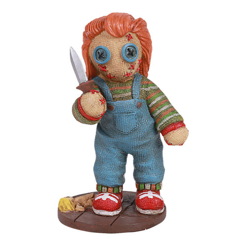 Chucky-inspired creepy doll figurine with stitched face and knife, unique spooky home decoration