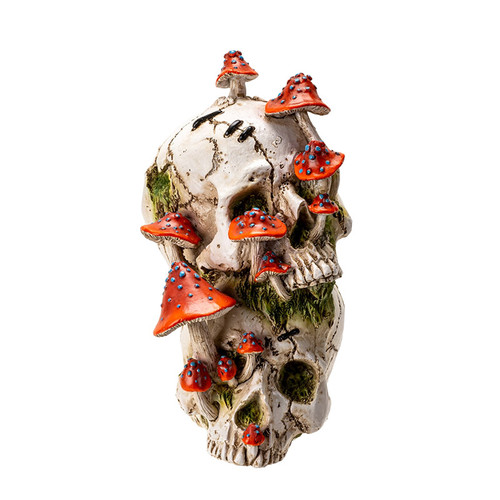 Gothic skull sculpture covered in red mushrooms, detailed fantasy decor with eerie forest vibe