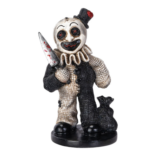 Horror clown statue with eerie grin and vintage outfit, spooky Halloween display piece