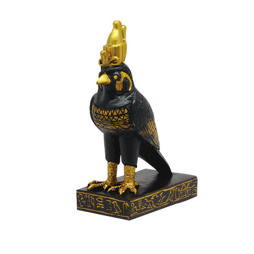 Black and gold falcon sculpture on ornate base, ancient Egypt style collectible ornament