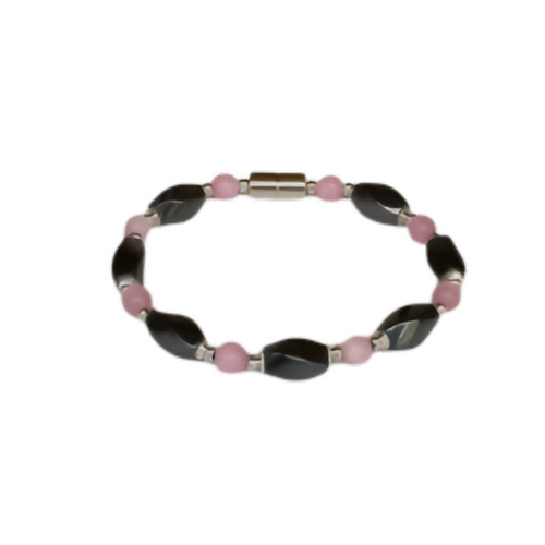 A rustic-chic magnetic anklet featuring twisted pink opal beads and long, antique-style silver tube beads with a polished magnetic clasp
