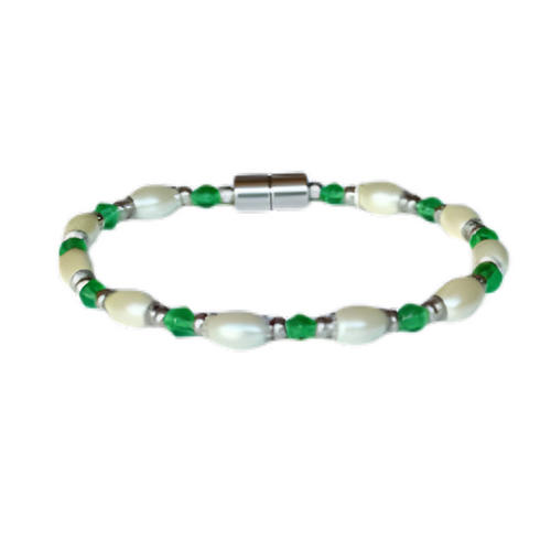 A sophisticated pearl accessory featuring a delicate pattern of off-white pearls and emerald-green crystals, perfect for a secure and stylish magnetic fit.