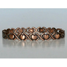 Vintage-inspired copper link bracelet with heart motifs and sleek modern look