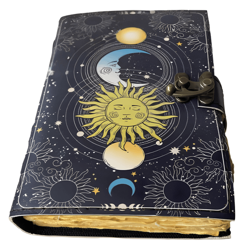 Sun and Moon Premium Leather Journal featuring an embossed celestial sun and moon motif on a vintage brown leather cover with a decorative metal clasp.