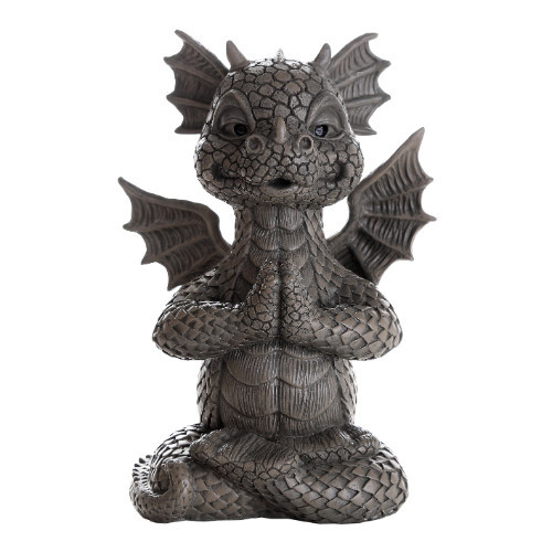 Decorative gray dragon statue in a seated yoga pose with hands in prayer, featuring textured scales, expressive eyes, and bat-like wings.
