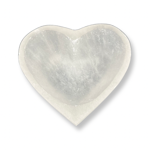 White selenite heart bowl with a smooth, polished surface and translucent crystal finish.