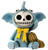 Blue elephant-skeleton figurine with a skull face, yellow bow, and holding a peanut, seated with one hand raised.