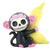 Adorable black monkey figurine with pink accents and a skeletal face, holding a bright yellow banana.