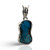 Side view of a Rough Turquoise Necklace showcasing a raw turquoise gemstone set in a handcrafted silver pendant.