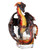 Colorful dragon figurine sitting in a glass filled with dark amber liquid, resembling rum, showcasing intricate details and vibrant colors.