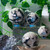 Assorted rainbow moonstone spheres showcasing iridescent shine and natural variations in size