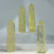 Four pale yellow, translucent citrine crystal points