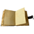 Open Green Forest Spirit leather journal displaying blank cream deckle edge pages and leather strap