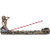 Bronze mermaid incense burner with colorful tail, resting on a wave-like base, holding an incense stick.