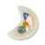 Selenite moon bowl holding colorful tumbled crystals, showcasing its crescent-shaped design.
