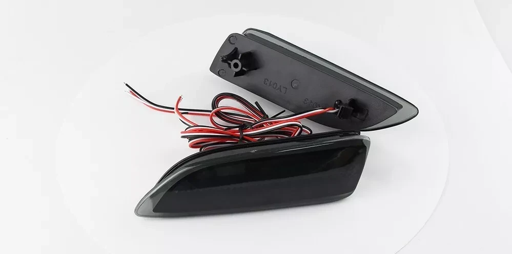 Enhance your 2011-2017 CT200H with our stylish smoked LED turn signal set for the rear bumper. Upgrade visibility and aesthetics effortlessly.