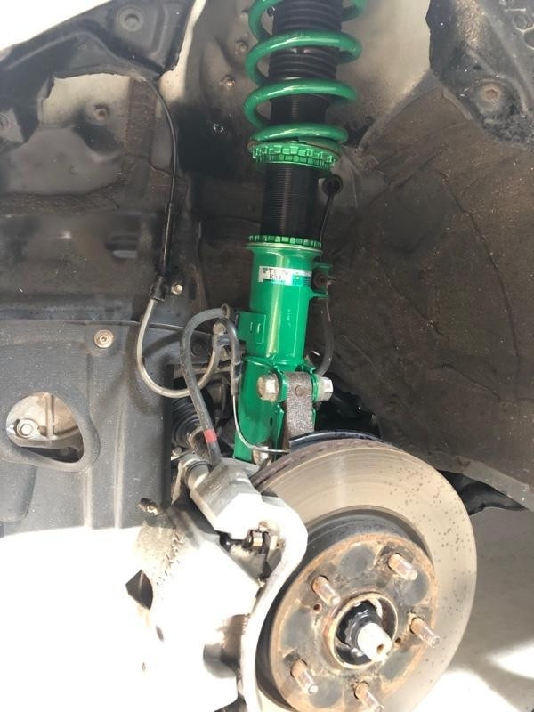 Discover the VSQ08-M1AS3 Tein RX1 Lowering Coilovers, designed specifically for the 2010-2015 Toyota Prius. Enhance your ride's performance and style today.