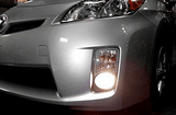 Upgrade your 2010-2011 Toyota Prius with Clear Housing OEM Style Fog Lights. Experience improved visibility and a sleek look for safer nighttime driving.