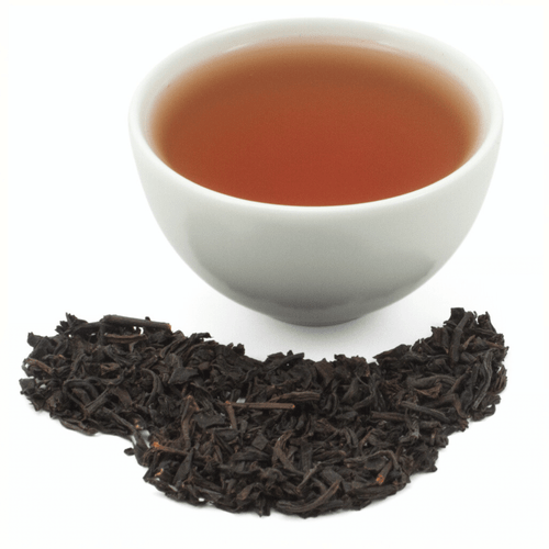 Loose leaf tea and tea cup