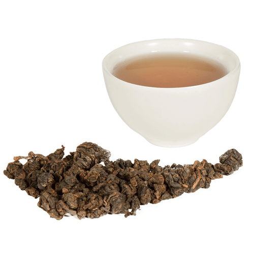 cup of tea with loose leaf tea