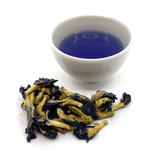 cup of tea with loose leaf flower