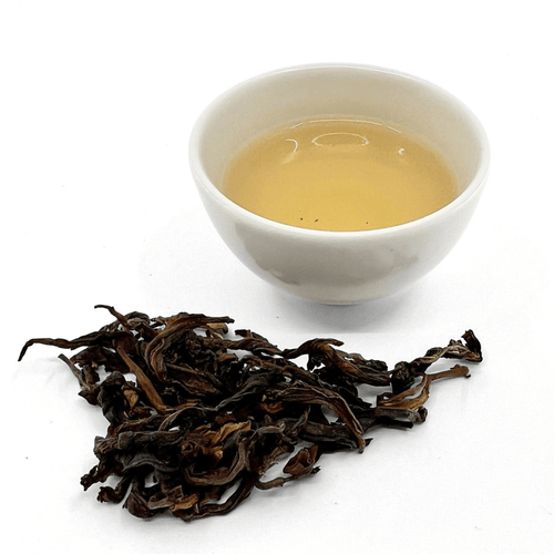 cup of tea with loose leaf tea