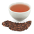 cup of tea with loose leaf tea