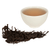 cup of tea with loose leaf tea