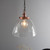 Hansen Grand Aged Copper with Clear Shade Pendant Light