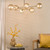 Vignette 6 Light Aged Brass with Twisted Amber Diffusers Pendant Light