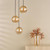 Dar Lighting Ophira 3 Light Antique Gold with Amber Ribbed Diffusers Cluster Pendant Light 