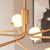 Aaron 10 Light Brushed Aged Brass with Matt Opal Spheres Pendant Light