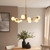Endon Lighting Aaron 10 Light Brushed Aged Brass with Matt Opal Spheres Pendant Light 