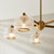 Stamford 5 Light Brushed Aged Brass with Clear Ribbed Glass Shades Pendant Light