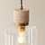 Travi Vintage Brass with Travertine Stone with Clear Shade Pendant Light
